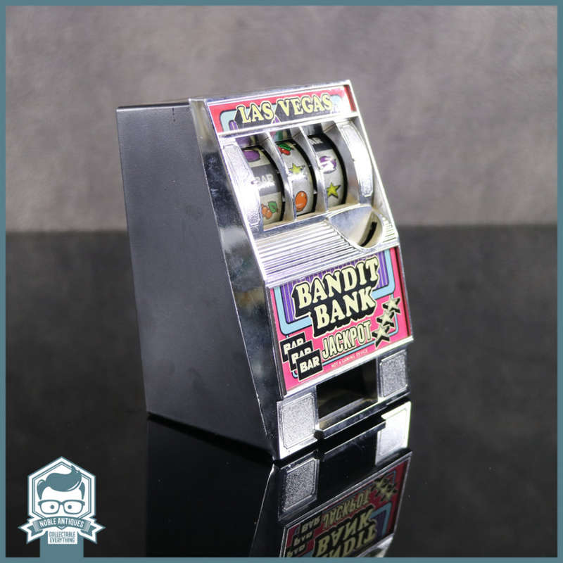 Original Vintage Bandit Bank Working Slotmachine and Savings Bank!!!