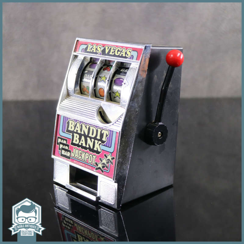 Original Vintage Bandit Bank Working Slotmachine and Savings Bank!!!
