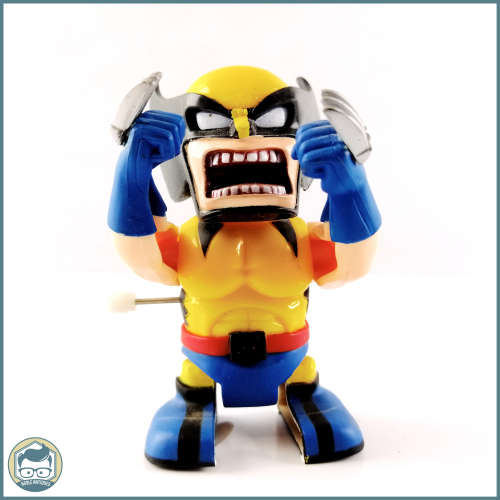 Original Vintage Wind Up Walking and Moving Super Hero Figurines!!!