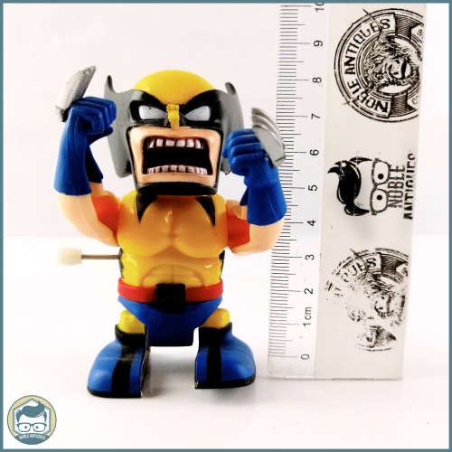 Original Vintage Wind Up Walking and Moving Super Hero Figurines!!!