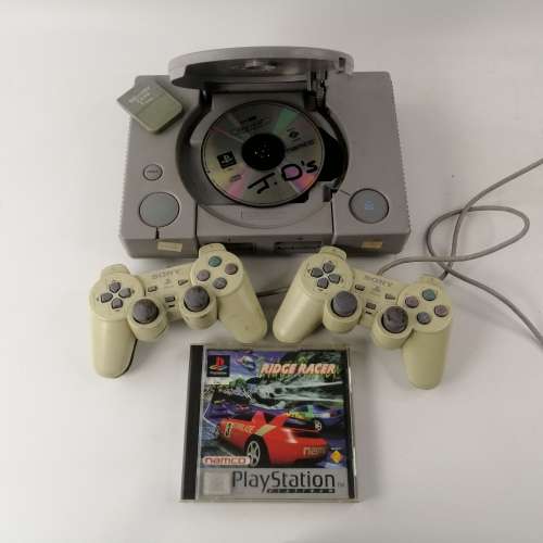 Super Cool!!! Original Working Playstation 1 Remotes and one Game!!!