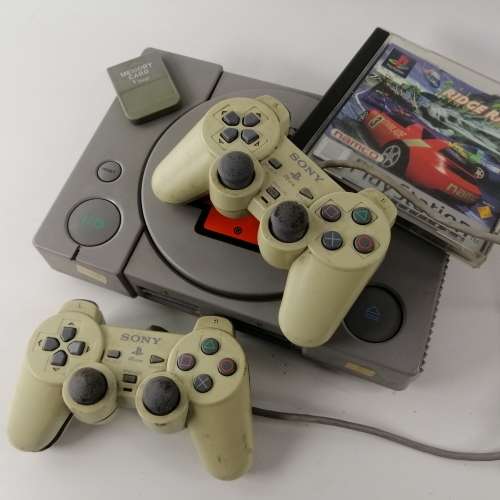 Super Cool!!! Original Working Playstation 1 Remotes and one Game!!!