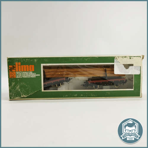Vintage Original Boxed Never Used LIMA HO Scale Twin Bolster wagon with wood planks load !!!