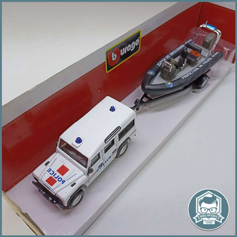 Bburago Land Rover Defender with trailer and Zodiac Police Boat Scale 1:50 (Boxed)!!!