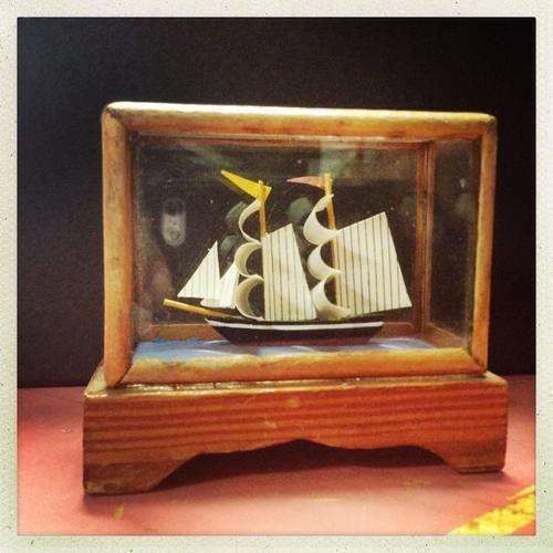 Miniture Japanese Ship in Glass and wood casing