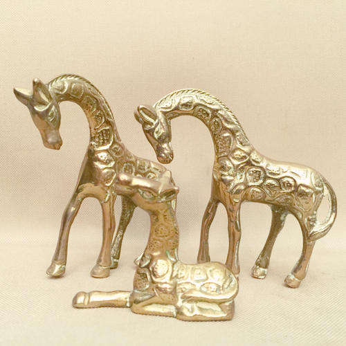 Three Solid Giraffe Figures