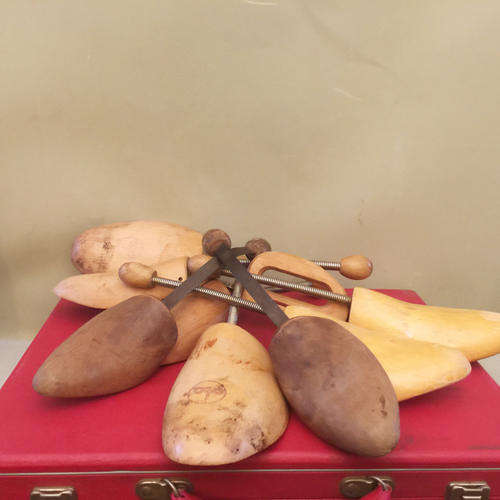 Large collection of vintage wooden shoe stretchers