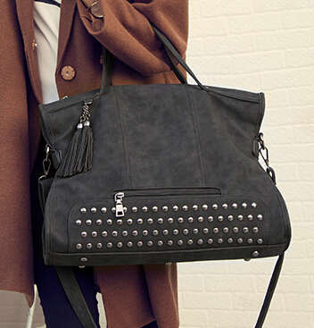 Large capacity rivets fashion ladies handbag. Black color. Stock in ZA