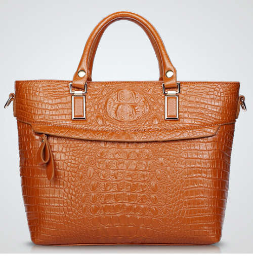Elegant crocodile pattern ladies handbag with strape, Brown color. Stock in ZA