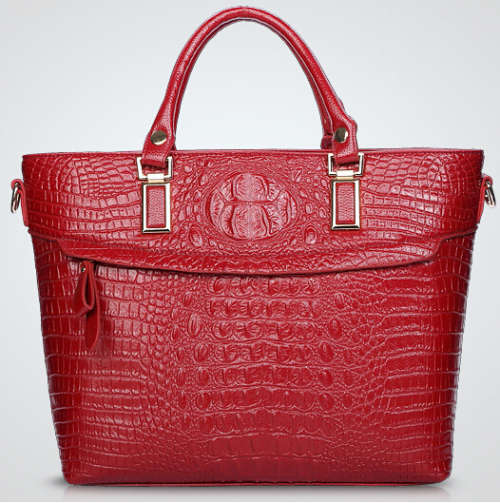 Elegant crocodile pattern ladies handbag with strape, Maroon color. Stock in ZA