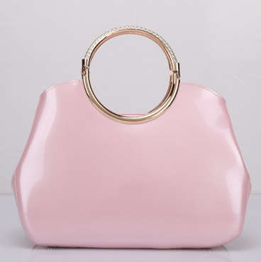 Shinning and smooth skin elegant ladies handbag. Pink color.