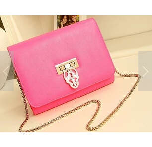 Fashion leisure chain and retro carve clip handbag. Rose color. Stock in ZA