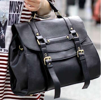 Fashion and classic ladies handbag, large capacity with strape. Black color. Stock in ZA