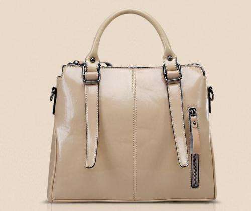 Noble style wild match lady handbag with belt. Beige white color.