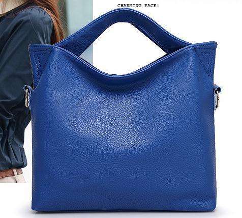 Modern design lady hand bag with strap. Blue color. Stock in ZA.