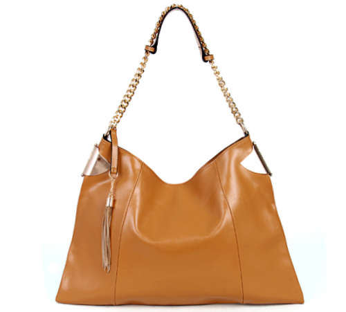 Genuine leather tassels bag. Small crack on the top edge.Light brown color.