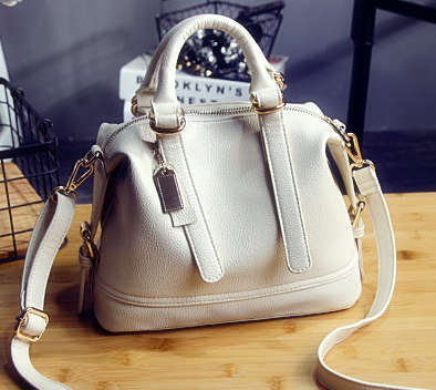 Wild matches fashion elegant leisure bag with strap. White color.