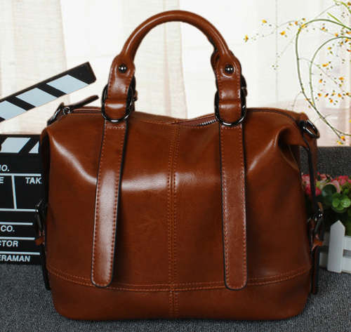 Genuine leather big capacity stars love style high quality ladies handbag. Brown color. Stock in ZA