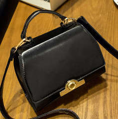 Retro style handbag. Black color. Stock in ZA.