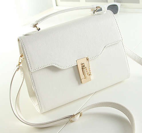 Small size square handbag. White color. Stock in ZA.
