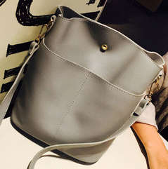 Simply design lady bag. Grey color. Stock in ZA.