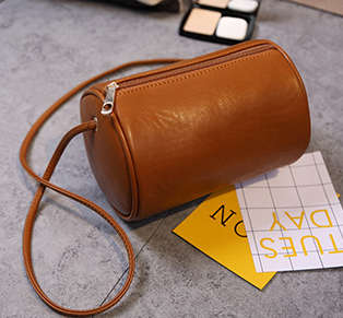 Fashion cylinder bag. Black color. Stock in ZA.