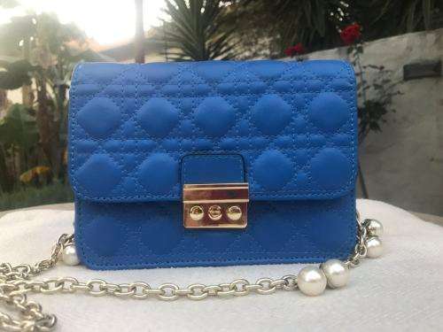 Genuine leather classic dating handbag, chain with pearls. Blue color. Stock in ZA