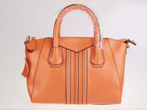 Genuine leather retro lady handbag. second layer cow leather. orange color. Stock in ZA.