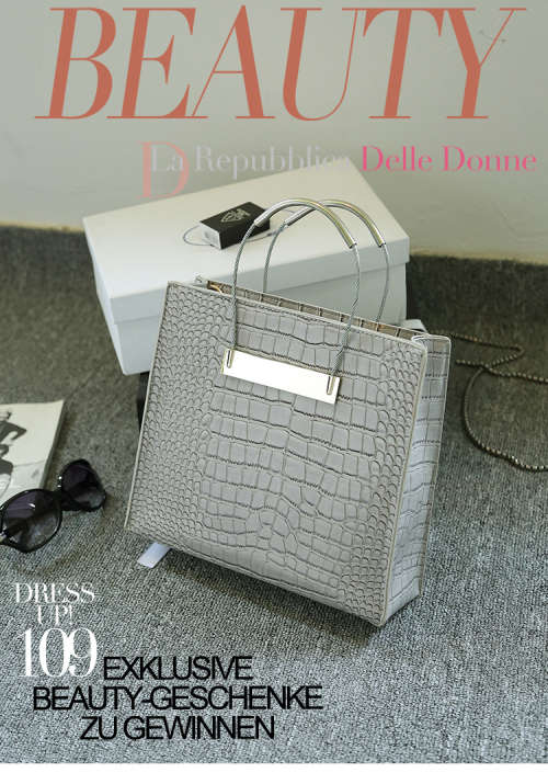 Crocodile pattern stereotyped fashion steel handle handbag. Grey color.