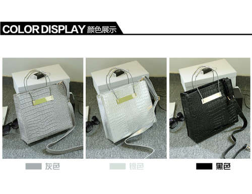 Crocodile pattern stereotyped fashion steel handle handbag. Grey color.