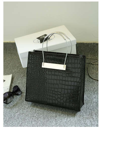 Crocodile pattern stereotyped fashion steel handle handbag. Grey color.