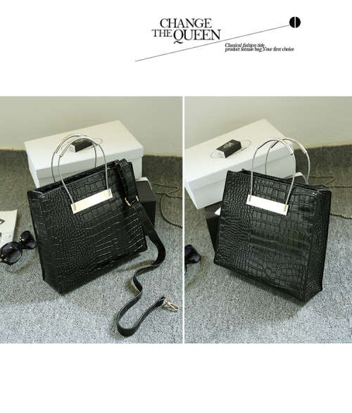 Crocodile pattern stereotyped fashion steel handle handbag. Grey color.