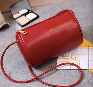 Fashion cylinder bag. Black color. Stock in ZA.