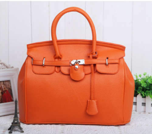 Orange color lady big bag with lock, shipping R30
