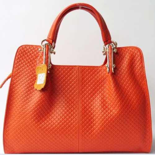 genuine leather Princess Kate loves style handbag. Orange color. Shipping fee R30