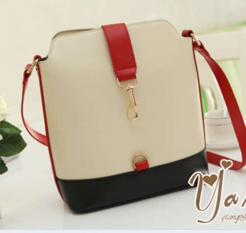 Nice design color joint magnetic snap ladies shoulder bag. Shipping fee R30