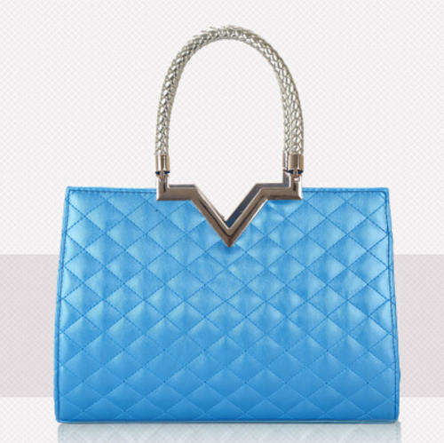 Classic magazines size ladies handbag. Blue color.