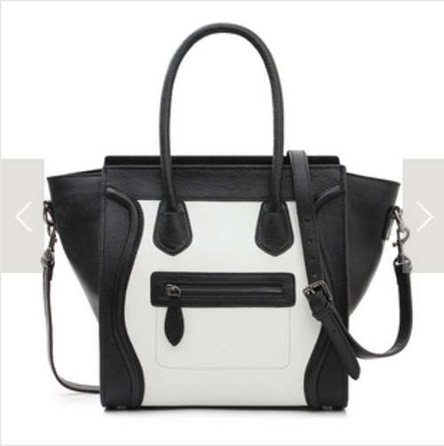 Genuine leather smile bag, lady handbag. Size small. color black joint white. Stock in ZA