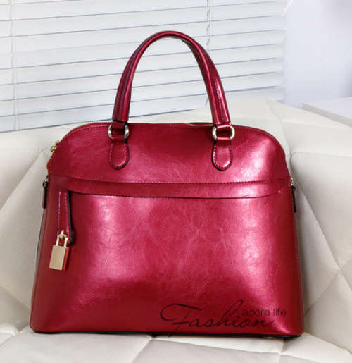 Genuine leather shell style handbag. Wine red color. Stock in ZA