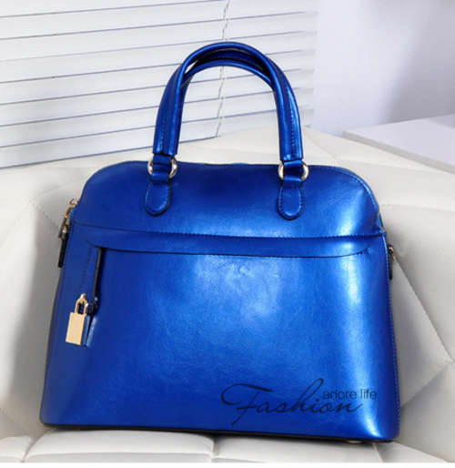 Genuine leather shell style handbag. Royal blue color. Stock in ZA
