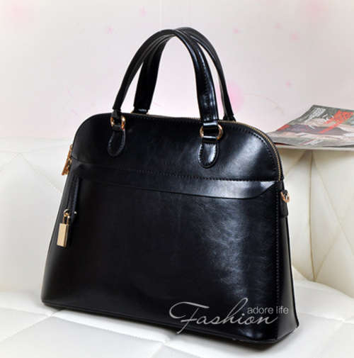 Genuine leather shell style handbag. Black color. Stock in ZA