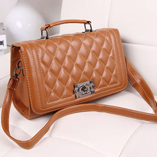 Leisure wild use ladies handbag. Brown color. Stock in ZA