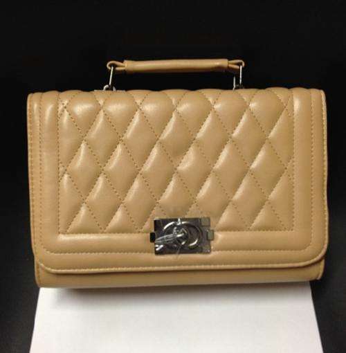 Leisure wild use ladies handbag. Apricot color. Stock in ZA