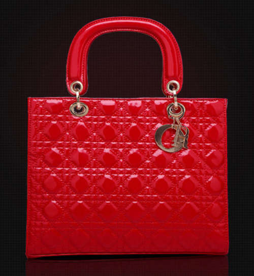 Princess Diana favour handbag. color red. With belt. Stock in ZA