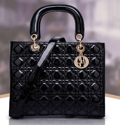 Princess Diana favour handbag. PU. color black. With belt. Stock in ZA