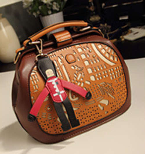 Summer fashion hollow out cute shoulder bag. Brown color. Stock in ZA