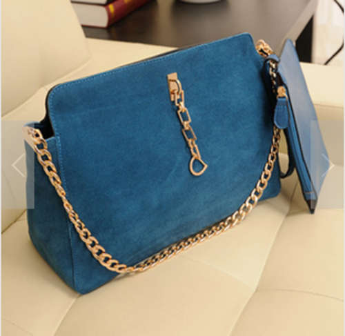 2 pieces nubuck elegant ladies handbag with chain and belt. Blue color. Stock in ZA