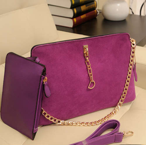 2 pieces nubuck elegant ladies handbag with chain and belt. purple color. Stock in ZA