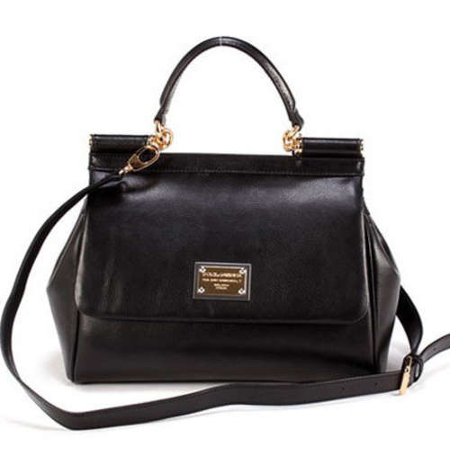 Genuine leather classic retro ladies handbag with belt. Stock in ZA