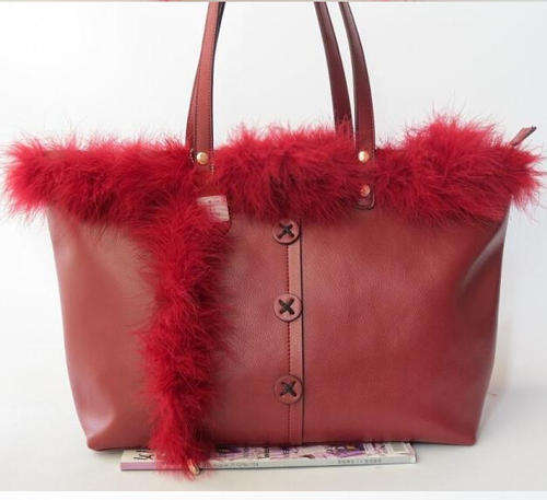 Large capacity feather genuine leather bag,feather removable.Red color.